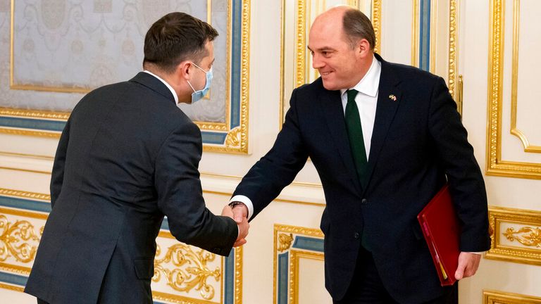Defence Secretary Ben Wallace, right, shakes hands with Ukrainian President Volodymyr Zelenskyy in November 2021