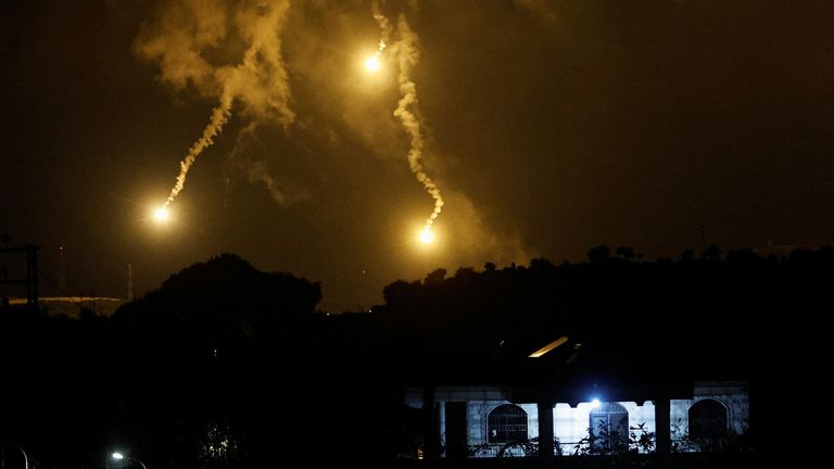 Flares, fired from the Israeli side, burn in the sky as seen from Ramyah near the Lebanese-Israeli border, in southern Lebanon 