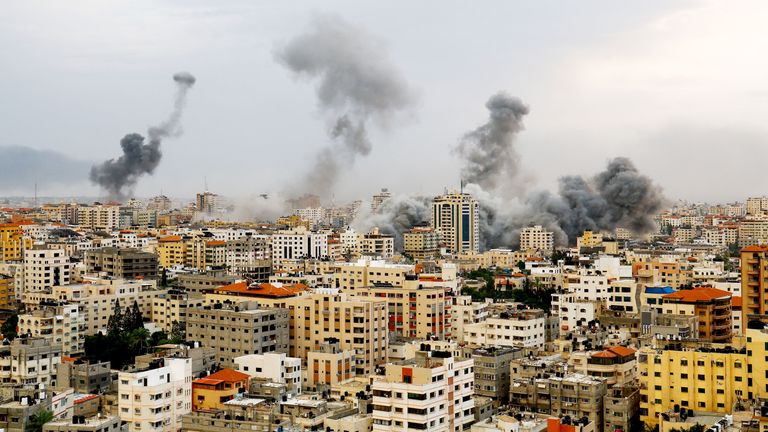 A general view shows smoke as it rises following Israeli strikes in Gaza, October 9, 2023. REUTERS/Mohammed Salem